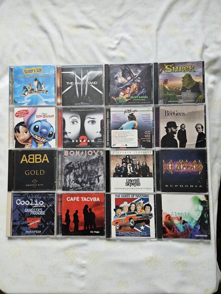 Classic Artists CDS Bon-Jovi, Prince, Lynyrd Skynyrd,Coolio,Dukes Of Hazard Discs Few Scratches But Playable Other Discs Clean $5 Each Album
