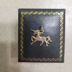 14 K Gold Pendant.  Weight Is 1.1 Grams 