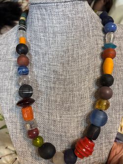 Beautiful multi colored , multi shaped vintage chunky necklace.