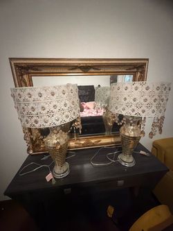 2 lamps and mirror