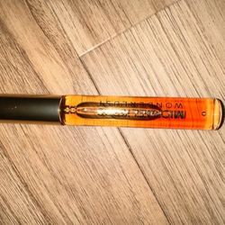 Michael Kors Wonderlust edp rollerball. 34oz/10ml