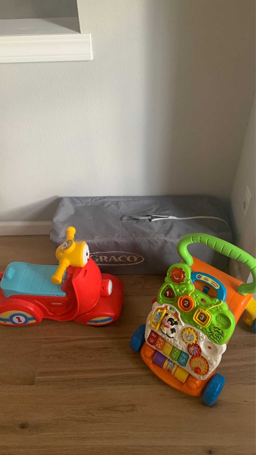 Free pack n play and 2 push toys