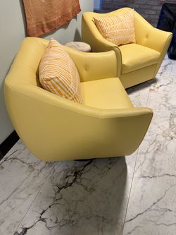 Contemporary Swivel Chairs in Yellow with Striped Pillows