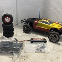 Traxxas Slash 1/16 VXL 4wd Ready to Run with battery charger tools and extra set of off road tires 