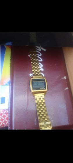 Gold Nixon watch