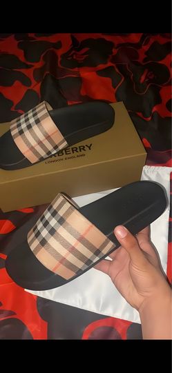 Woman’s burrberry slides