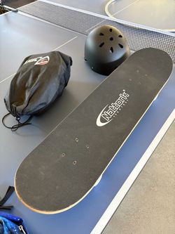 Skateboard, 31 inches long, kids helmet, knee, elbow,and wrist pads included
