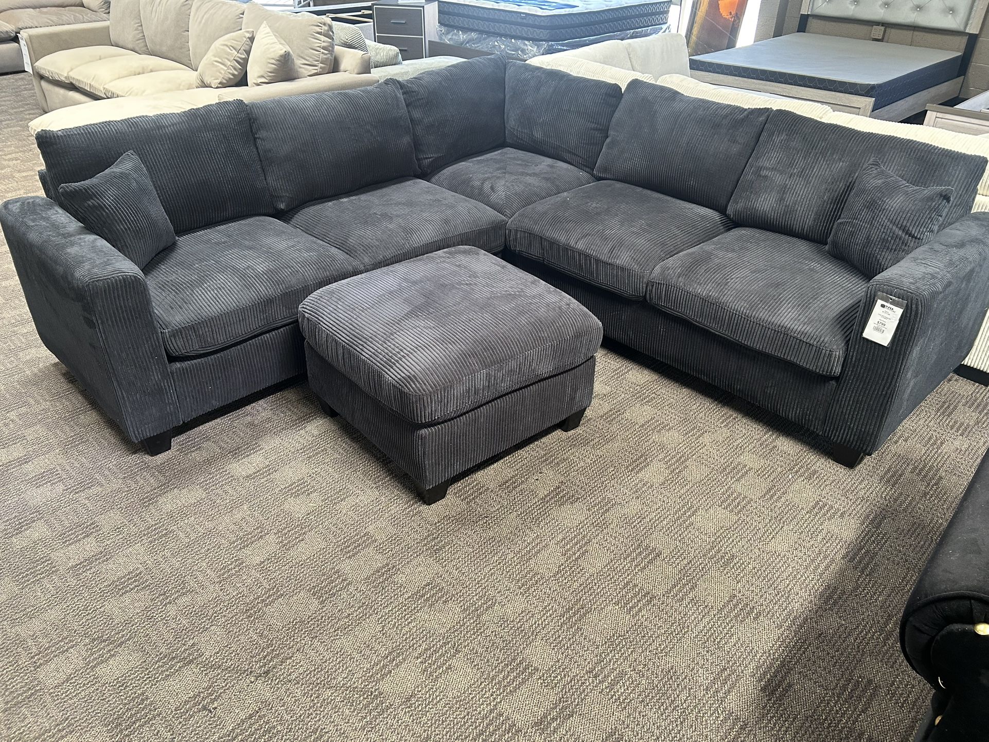 NEW comfy Black Sectional And Ottoman 