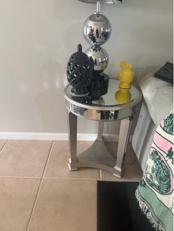 Two mirrow end tables.