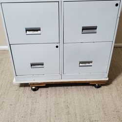 Letter sized four drawer metal file cabinet
