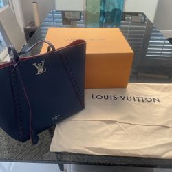 Authentic  and Louis Vuitton Great Condition Blue, Lockme Purse