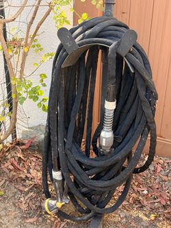 Garden hose with stand