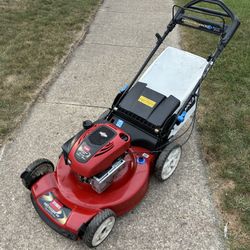 Toro Smart Stow Personal Pace Self Propelled Lawn Mower with Bag 