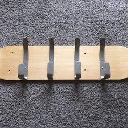 Skate deck clothes hanger