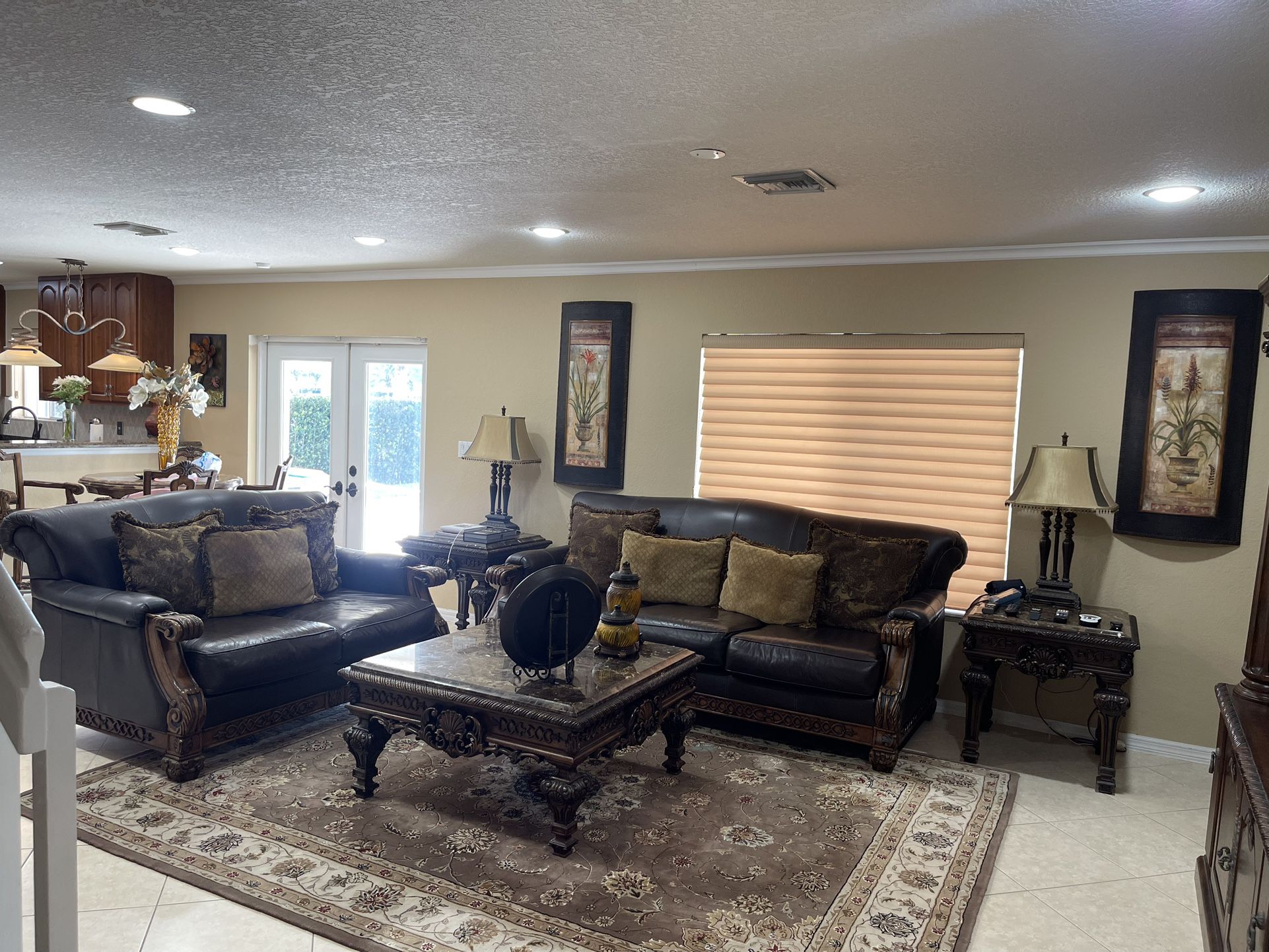 Living Room,wall unit,coffee table,pictures,lamps,light fixture,couch,console,breakfast table