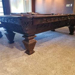 Pool Table With Lots of Carving
