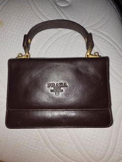 Prada brown calfskin leather clutch/handbag