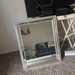 Wall mirror and love seat