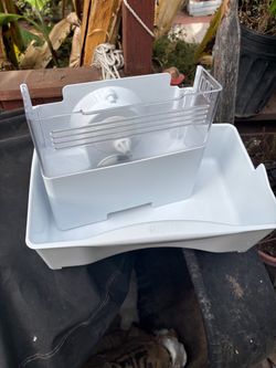 LG thing refrigerator ice crusher bucket in door