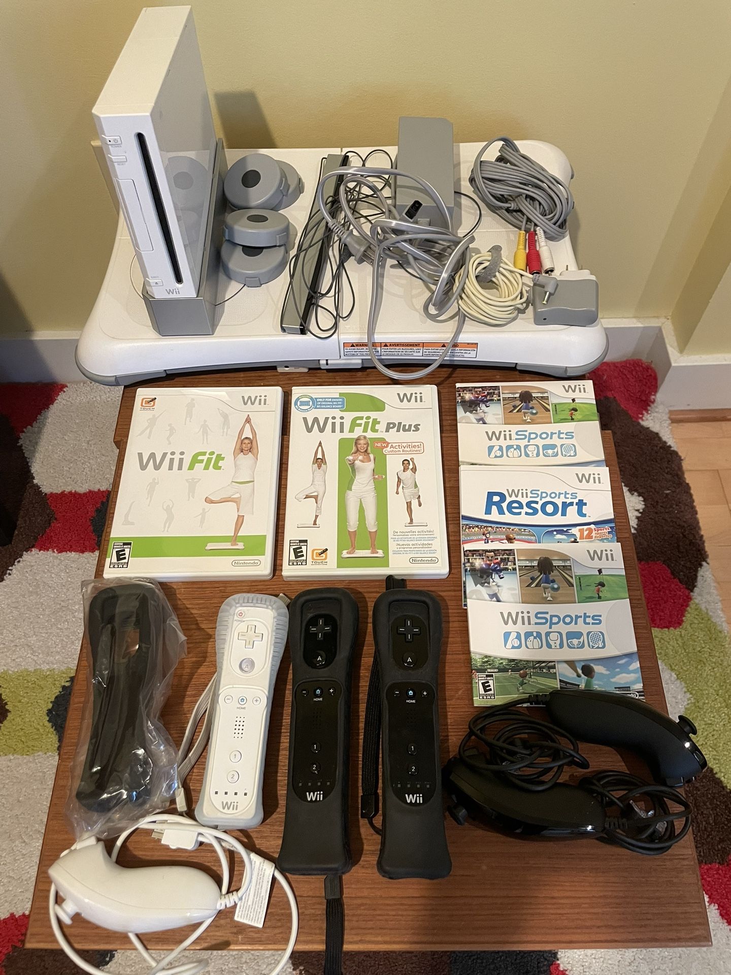 Nintendo Wii Console Bundle – 3 Controllers + Games + Balance Board – $80