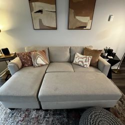 Tech-Enhanced Comfort: Sofa with Cup Holders, Charging Ports, and Matching Ottoman