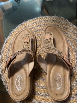 Atalina brand embellished thong wedge sandals feature a sparkling rhinestone design on the upper strap.