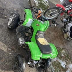 Four Wheeler Runs Top Back. Tires Are Locked Up Need Work To Both Of Them, But They Both Run
