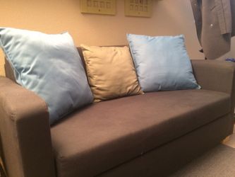 Moving sale: full-sized sofa bed - free pillows