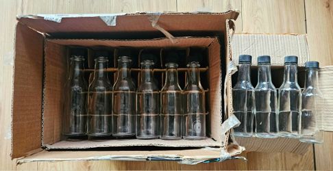29 EMPTY GLASS BOTTLE WITH BLACK CAP