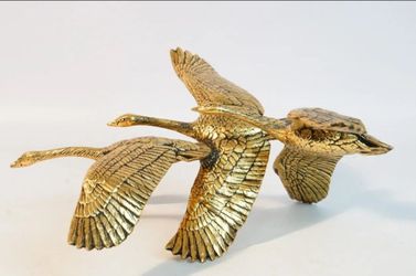 "The Flight," a signed and numbered art piece depicting flying geese, created by artist Gunther Granget as part of the Spirit of the Wild series.