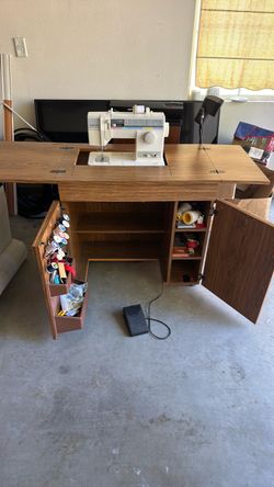 Singer Sewing Machine with Cabinet