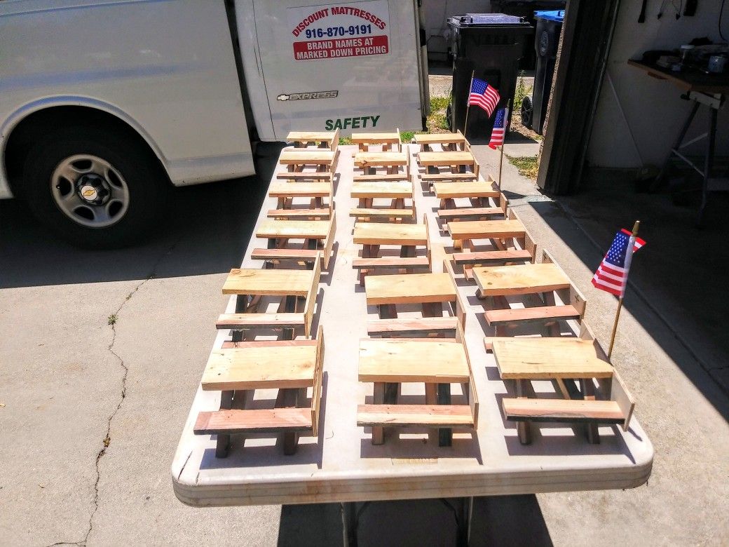 Rustic squirrel picnic tables