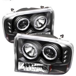 Spyder Auto F250/F350 Excursion Headlights Brand New 