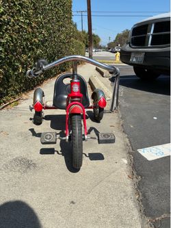 Schwinn Red Tricycle with Black Seat and Chrome Fenders, 3 WheelsSchwinn