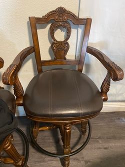 Ornate Carved Wood Swivel Bar Stool