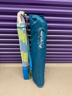 Beach tent and beach umbrella