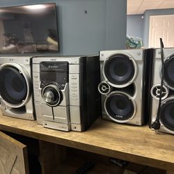 Sony Mini Hi-Fi Component System, including: 	•	The main unit (CD, cassette, tuner, MP3 playback) 	•	Three matching Sony speakers: two main 