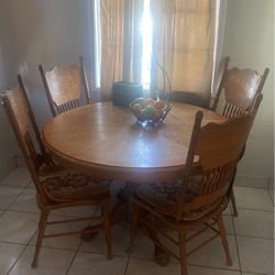 This is a beautiful breakfast table with 4 wooden chairs and all for $110