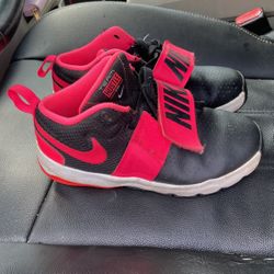 Used Black And Pink Nikes Size 2