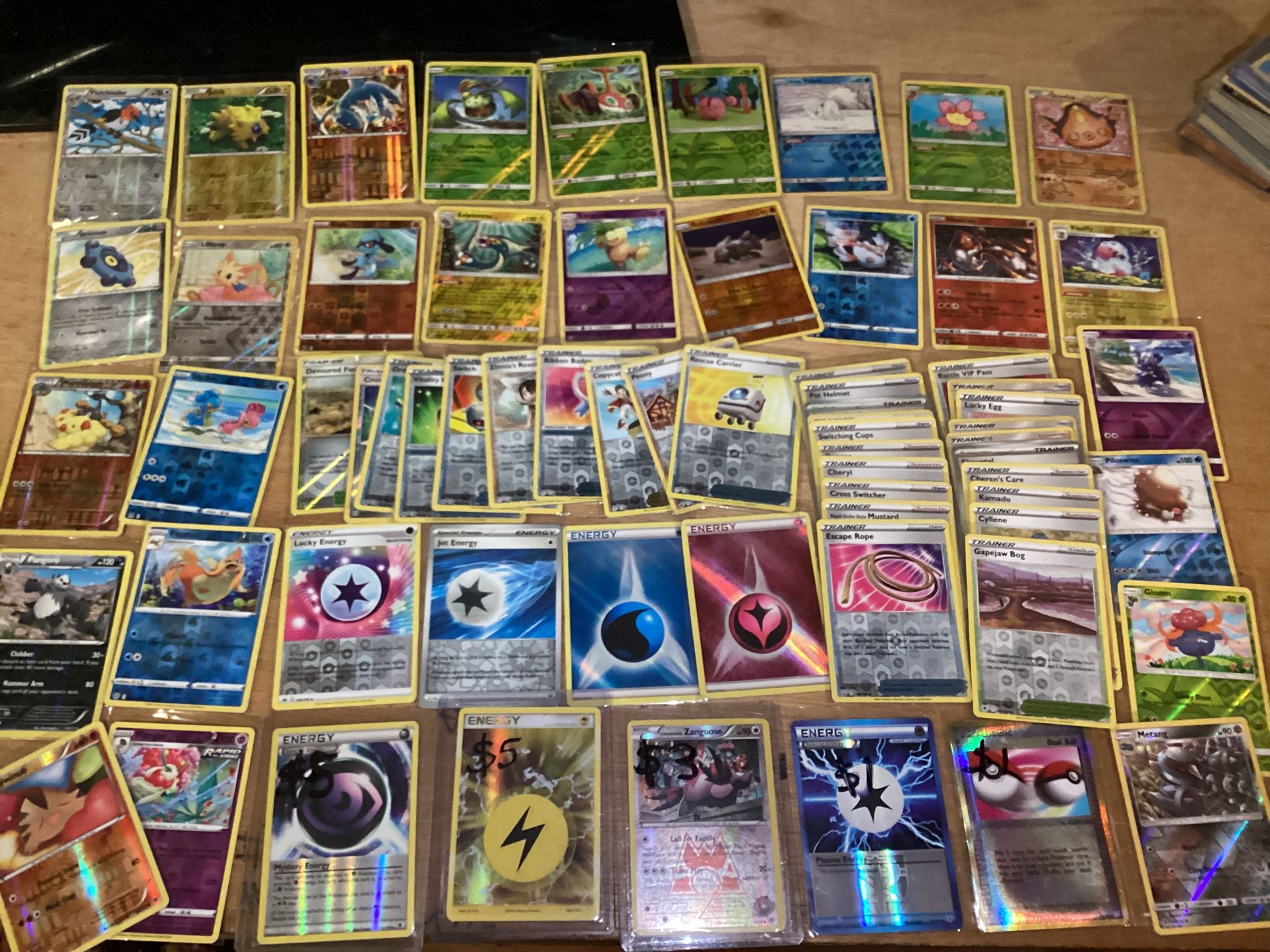 67 Pokémon Reverse Holo card lot from 2004 through 2023