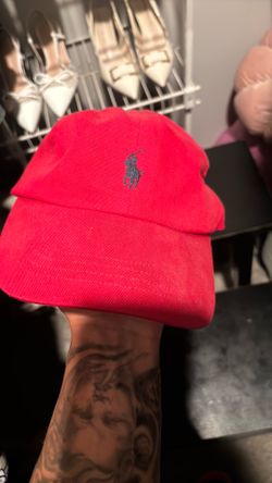 Red polo hat