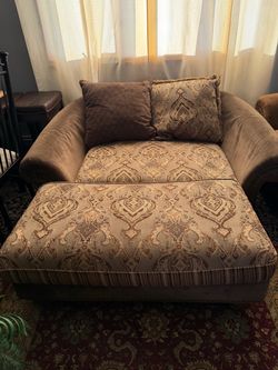 Oversized loveseat with pillows and ottoman