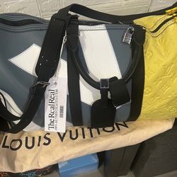 Louis Vuitton Bandouliér Keepall 50
