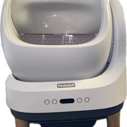 Pet safe self scoop free litter box