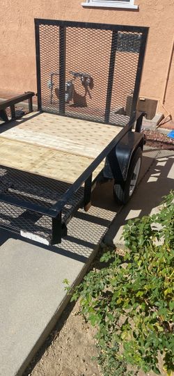 Utility Trailer with Mesh Sides and Ramp