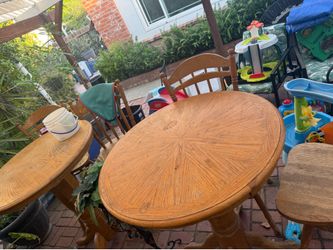 Two tables with 4 chairs