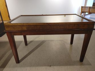 Wooden display case with glass top and removable bed