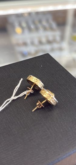Earrings 10kt 4.5 Grms medusa with diamonds