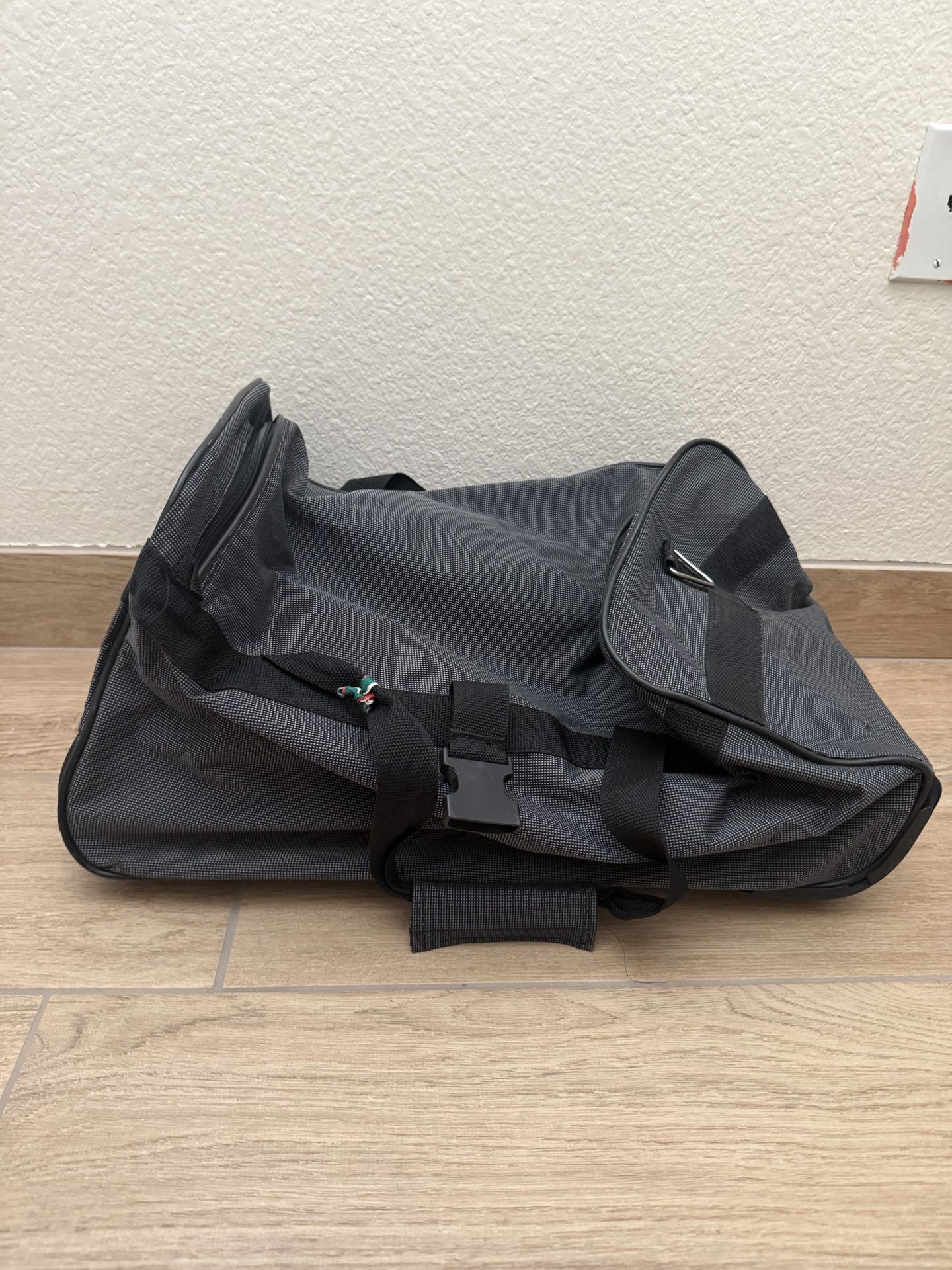 Rolling travel duffle bag with wheels