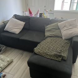 Sectional couch With Pull Out Bed And Storage